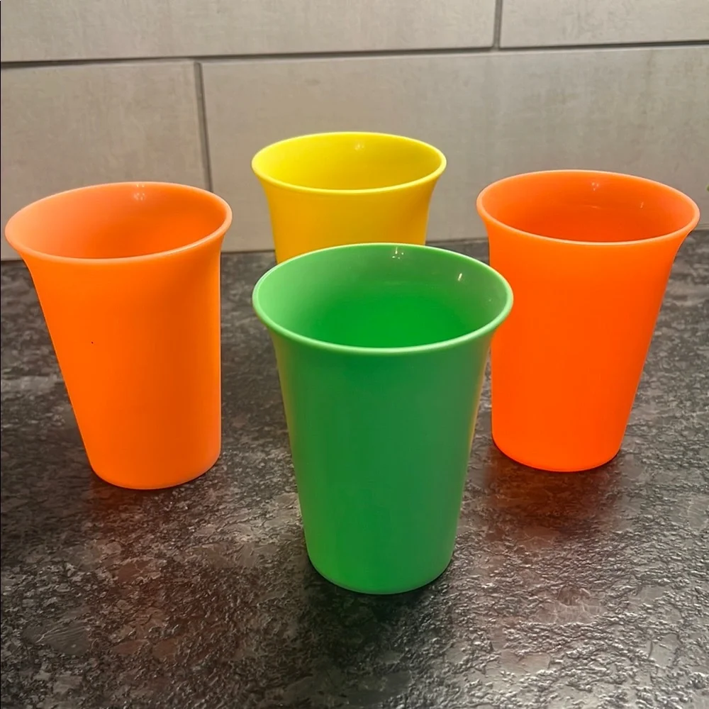 Set of 4 6oz kids cups by Tupperware. Vintage. New without tags. Bold colors